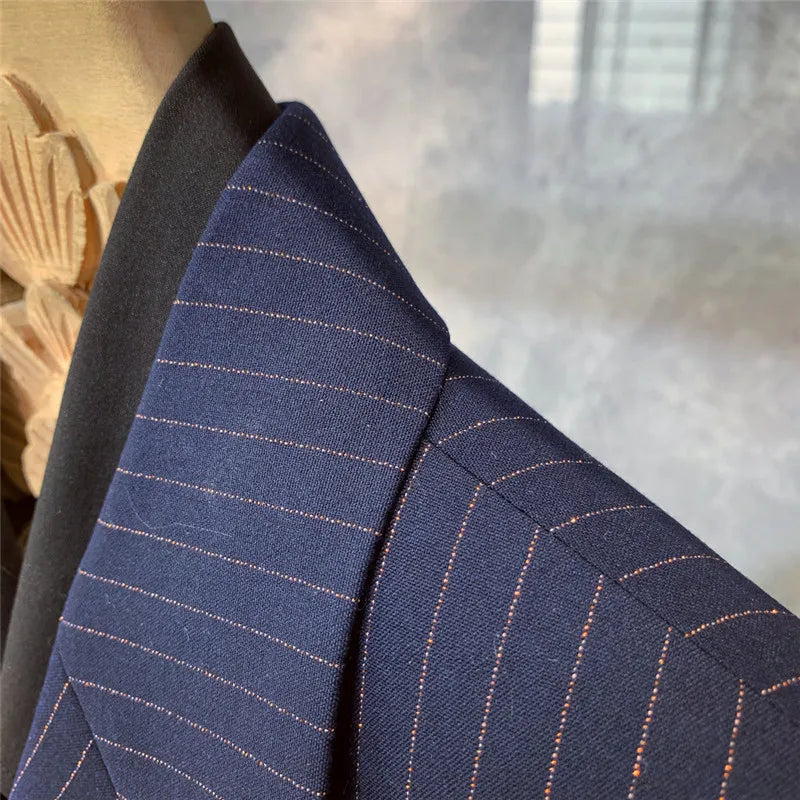 Elegant men's navy blue pinstripe suit, excellent formal wear for weddings, business, or evening events.