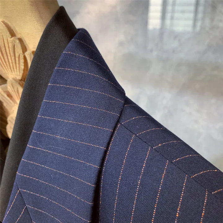 Elegant men's navy blue pinstripe suit, excellent formal wear for weddings, business, or evening events.