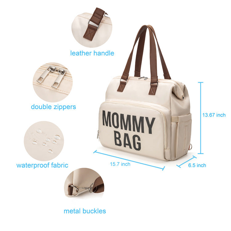 Stylish women's diaper backpack, grey, with changing pad and stroller clips, baby transport