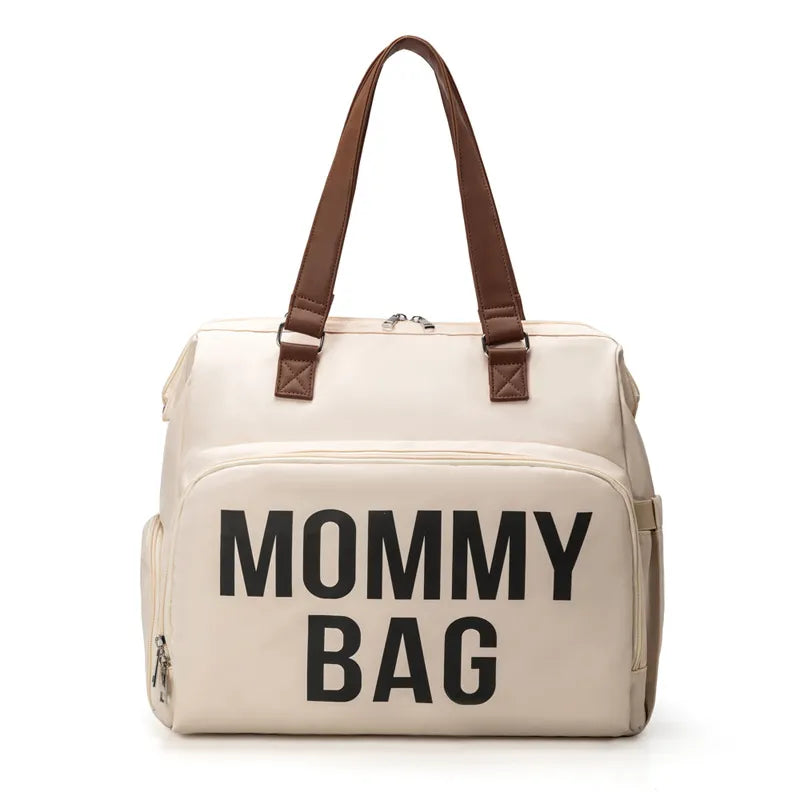 Baby essentials backpack: black, durable polyester, for bottles, wipes, and clothes, travel friendly