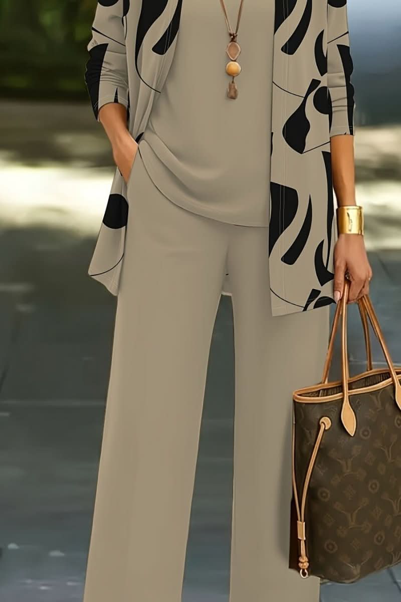 Stylish women's abstract print 3-piece set, featuring a coordinated top, pants, and cardigan for casual wear.