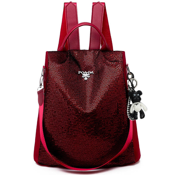 Woman wearing a stylish anti-theft commuter backpack, perfect for daily use, travel & fashion.