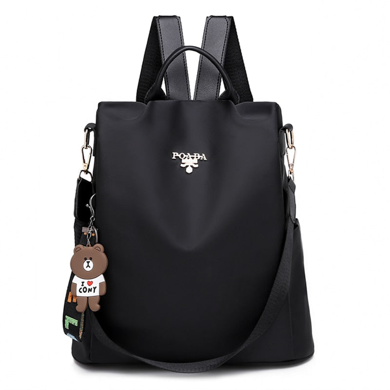 Close-up of the durable, water-resistant fabric of a secure women's anti-theft travel backpack.