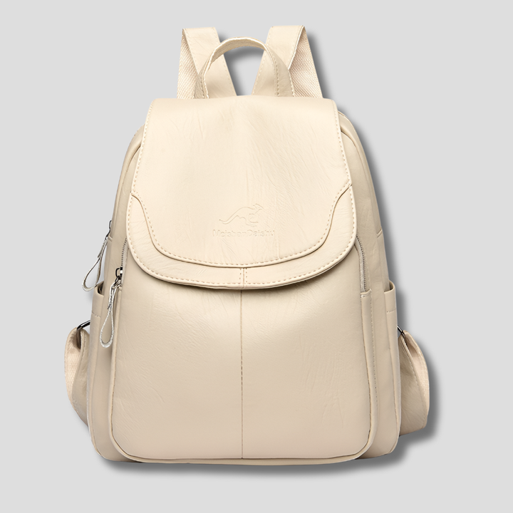 Commuter-friendly women's anti-theft flap backpack; secure, stylish & organized for daily use.