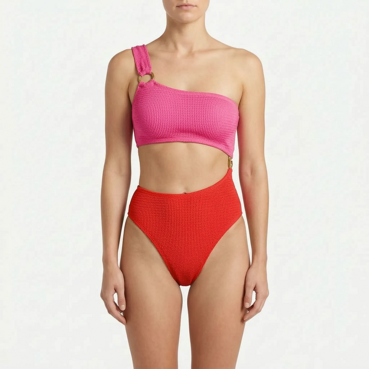 Modern women's asymmetric monokini swimsuit. Stylish cut-out one-piece design, perfect trendy beachwear or resort outfit.