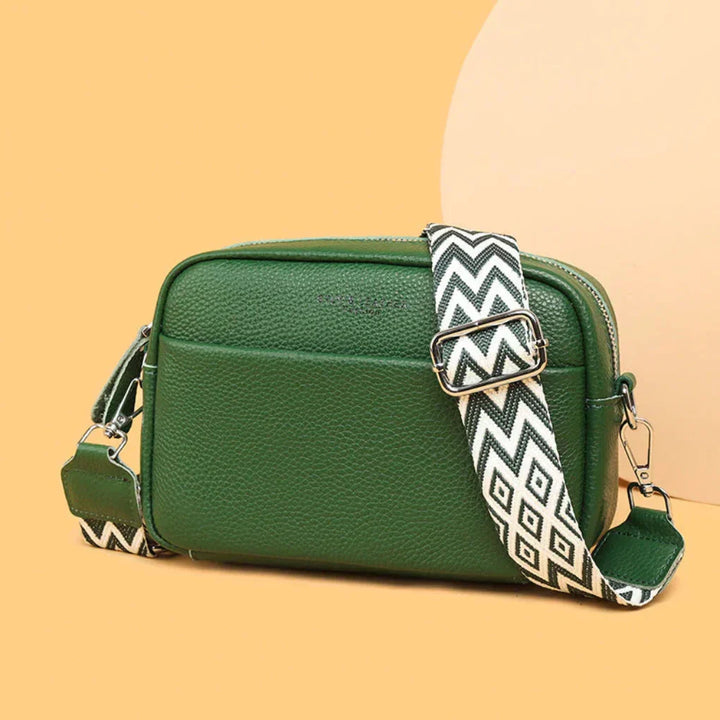 Fashionable khaki women's shoulder bag with a distinctive geometric strap. Perfect versatile accessory.