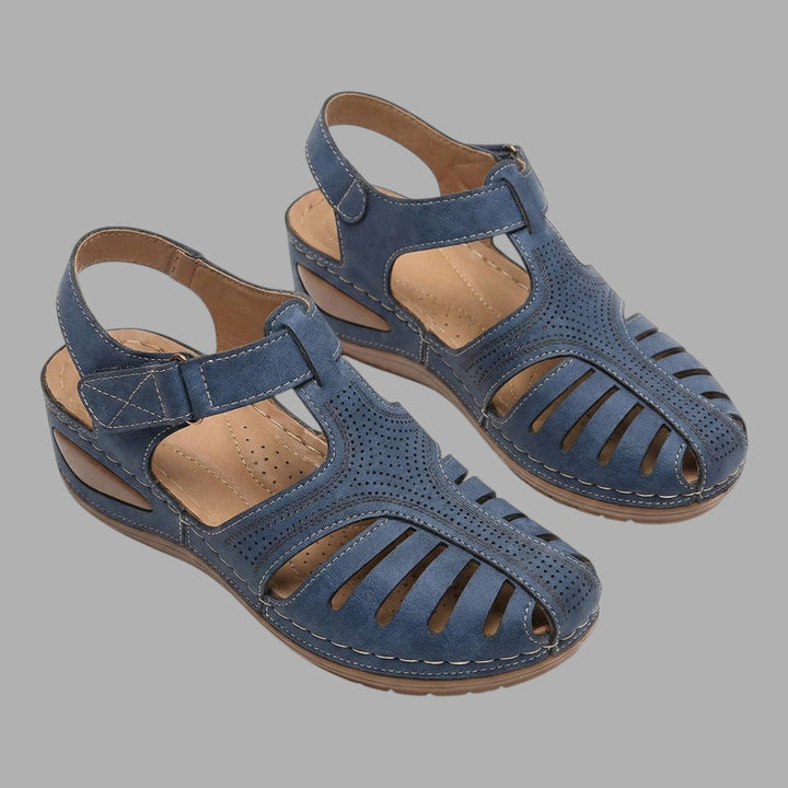 Stylish women's comfortable wedge sandals for summer. Open-toe, breathable casual footwear for everyday wear.