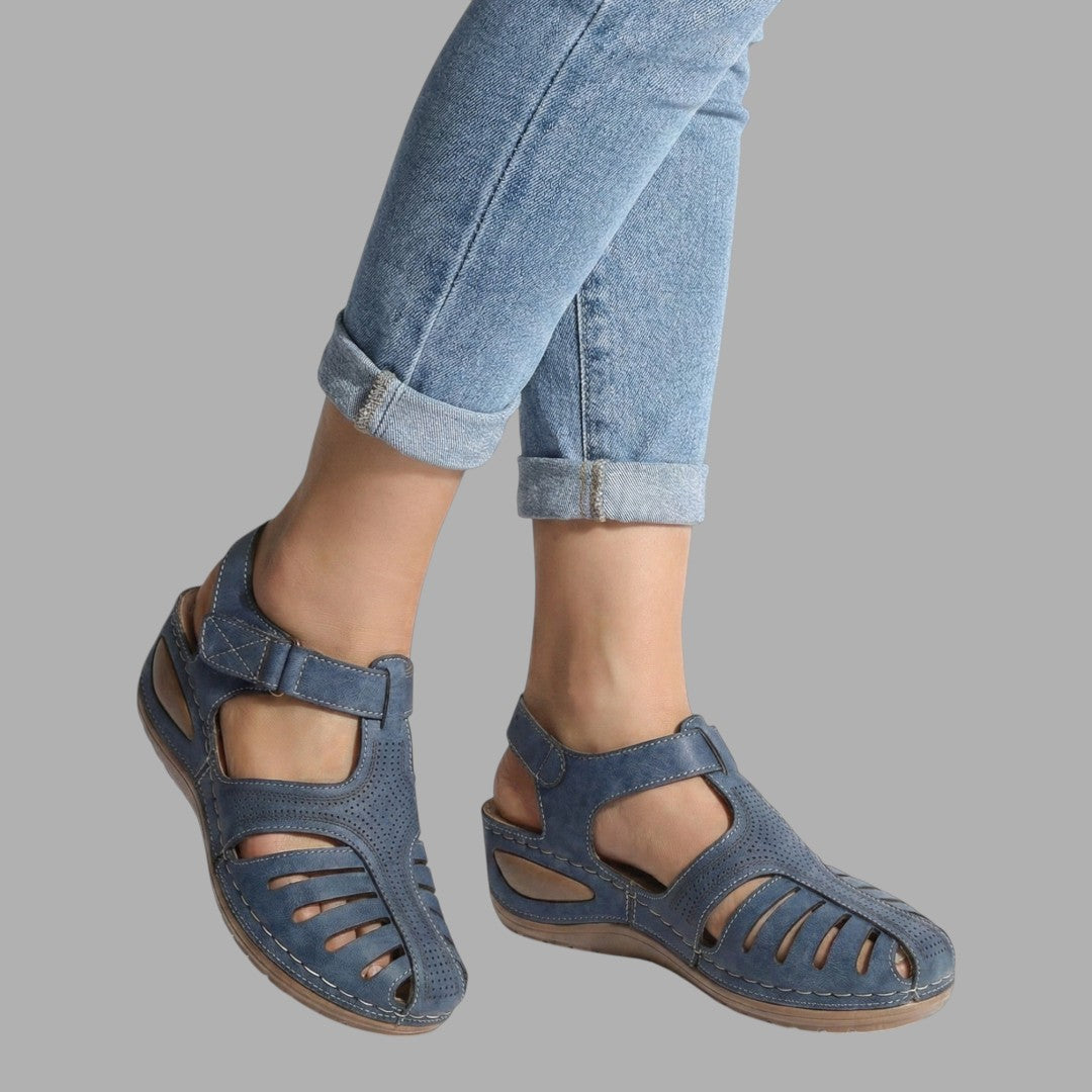 Chic slip-on wedge sandals for women, offering supportive comfort. Perfect casual footwear for warm weather.