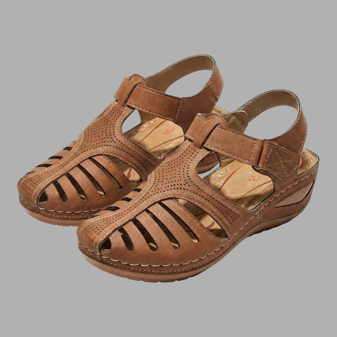 Supportive women's wedge sandals with an open toe design. Comfortable & stylish footwear for casual summer days.