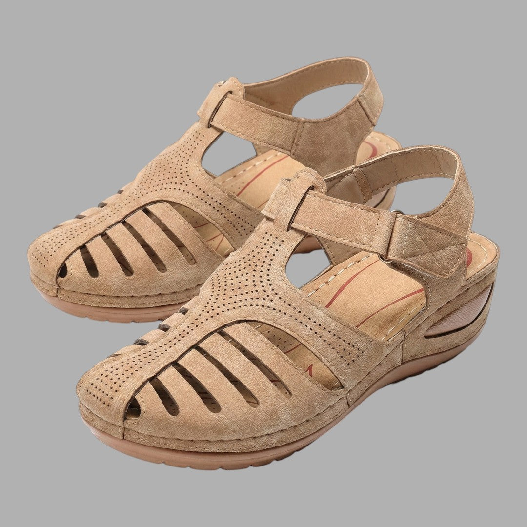 Breathable women's wedge sandals, ideal for warm weather. Comfortable slip-on casual footwear with a chic design.