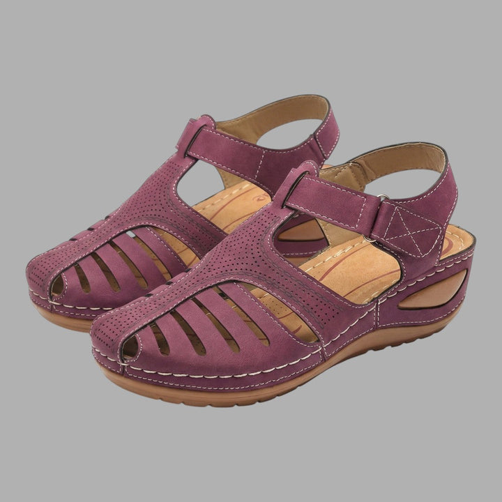 Modern women's comfortable wedge sandals. Slip-on, open-toe footwear combining style, support, & breathability.