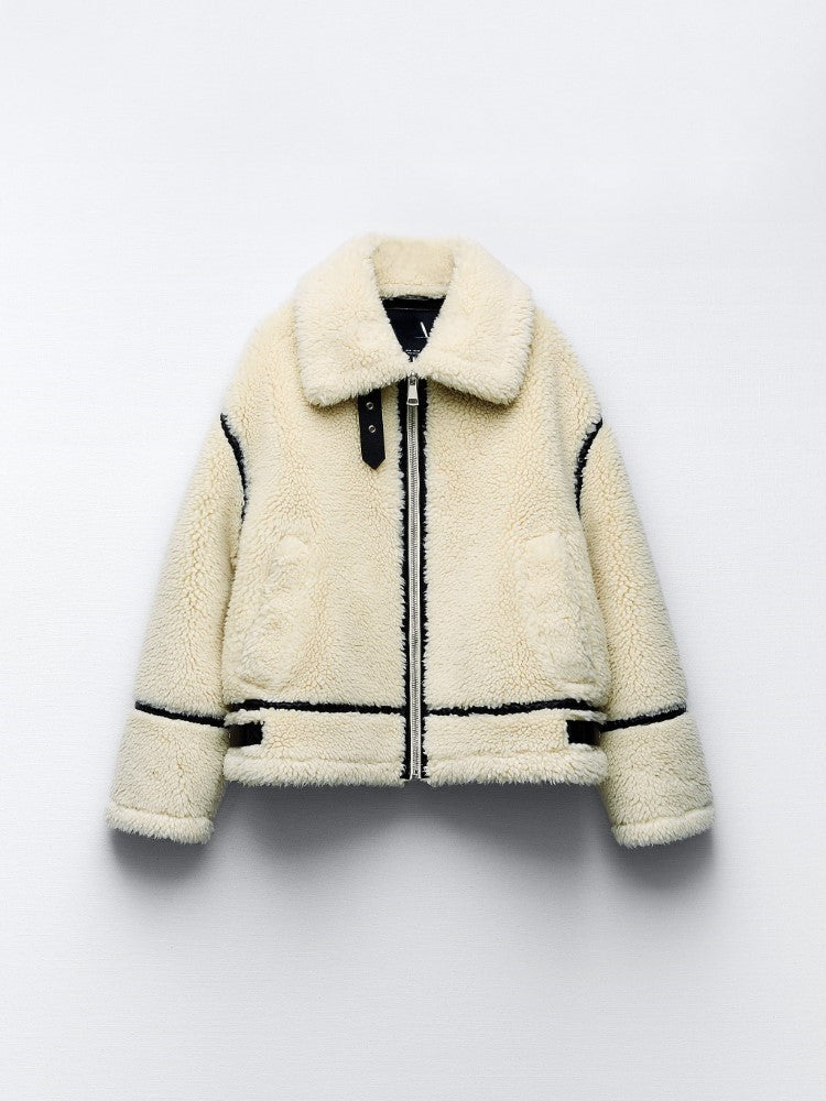 Stylish women's cozy aviator jacket, perfect for chic winter fashion, featuring a faux fur collar and warm lining.