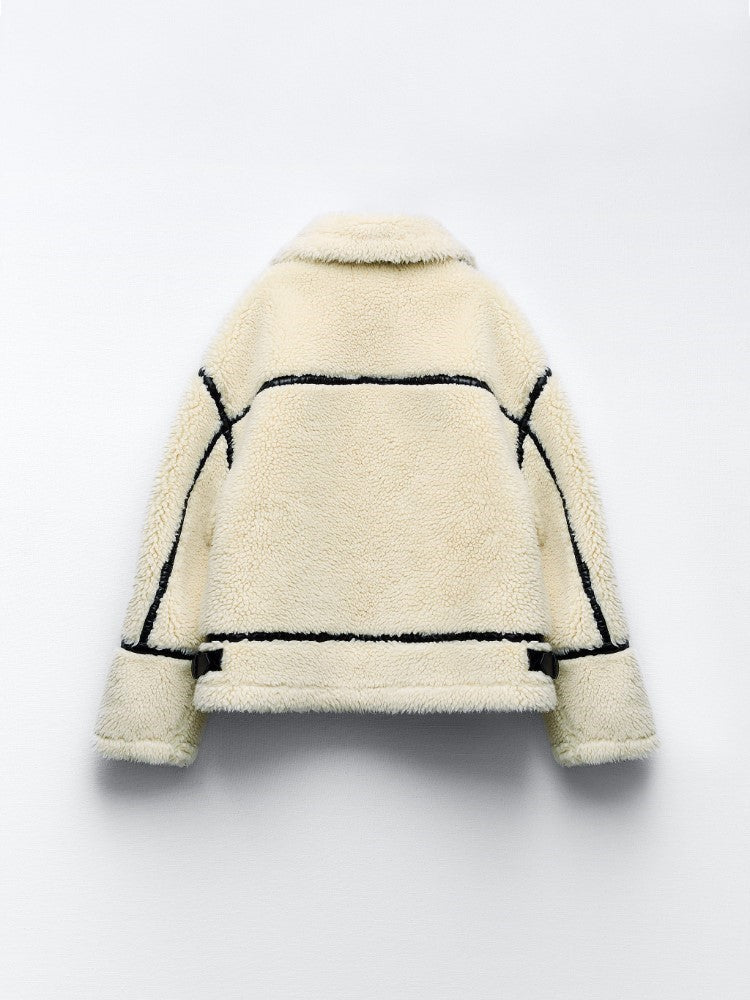 Comfortable women's aviator jacket with soft shearling lining, ideal for warm and trendy winter outerwear.