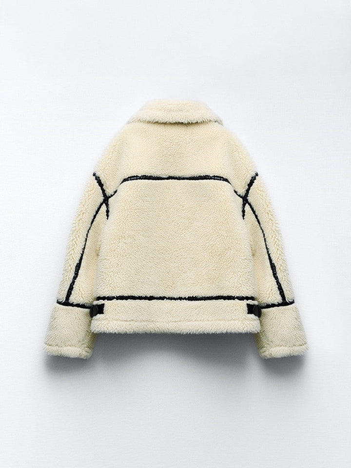 Comfortable women's aviator jacket with soft shearling lining, ideal for warm and trendy winter outerwear.