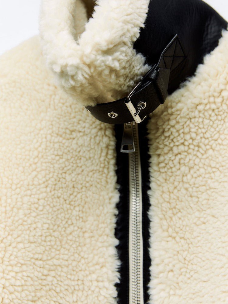 Chic women's cozy aviator jacket, a trendy statement piece for stylish winter fashion and everyday warmth.