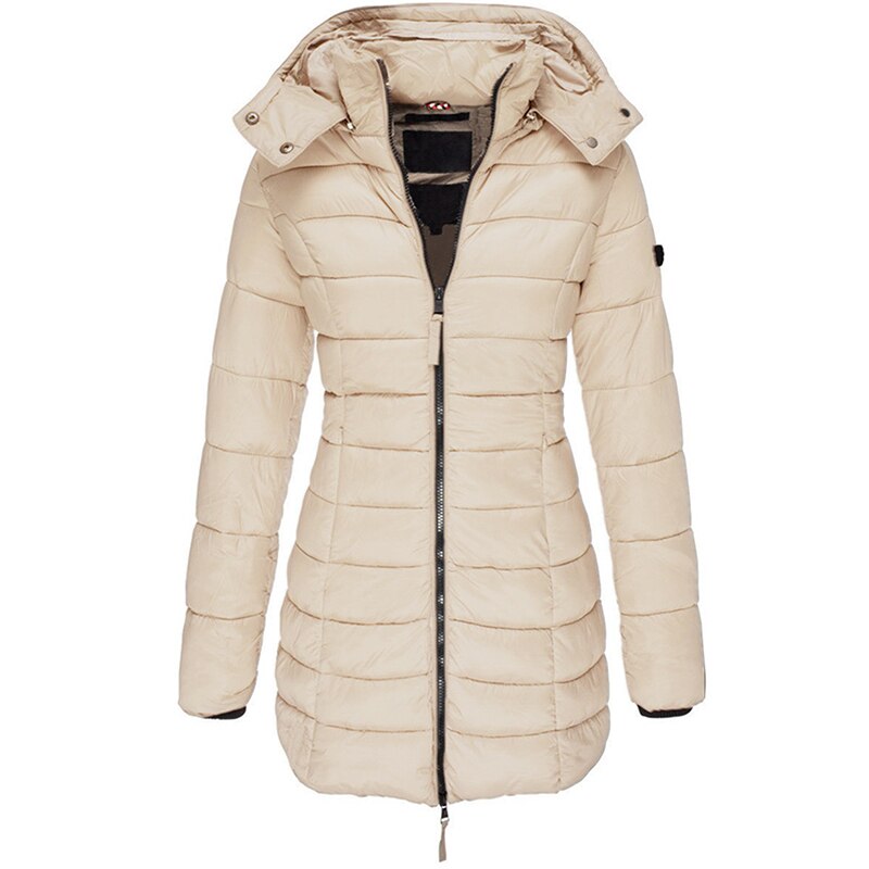 Insulated women's winter outerwear. Cozy and stylish hooded jacket for fall and winter fashion.