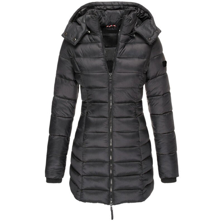 Women's stylish insulated hooded winter puffer jacket, ideal for warmth & modern fall fashion.