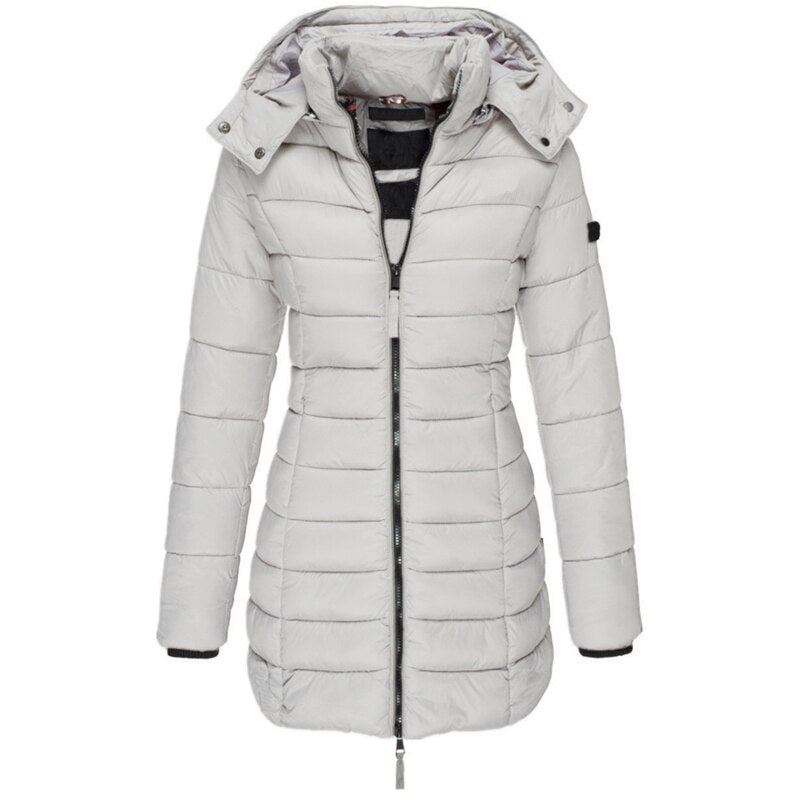 Versatile women's insulated hooded winter jacket, offering warmth and style for chilly fall and winter days.