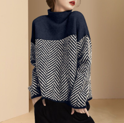 Detail shot: Soft textured knit of a women's cozy turtleneck sweater, highlighting warmth and style.