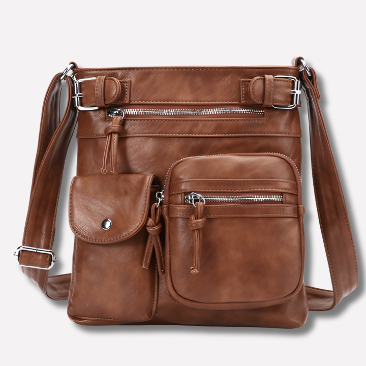 Stylish women's crossbody bag with multi-pocket organization for everyday essentials & travel.