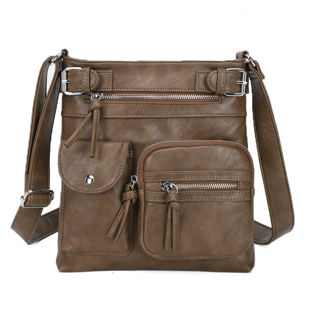 Fashion accessory: women's organized multi-pocket crossbody bag, perfect for stylish everyday wear.