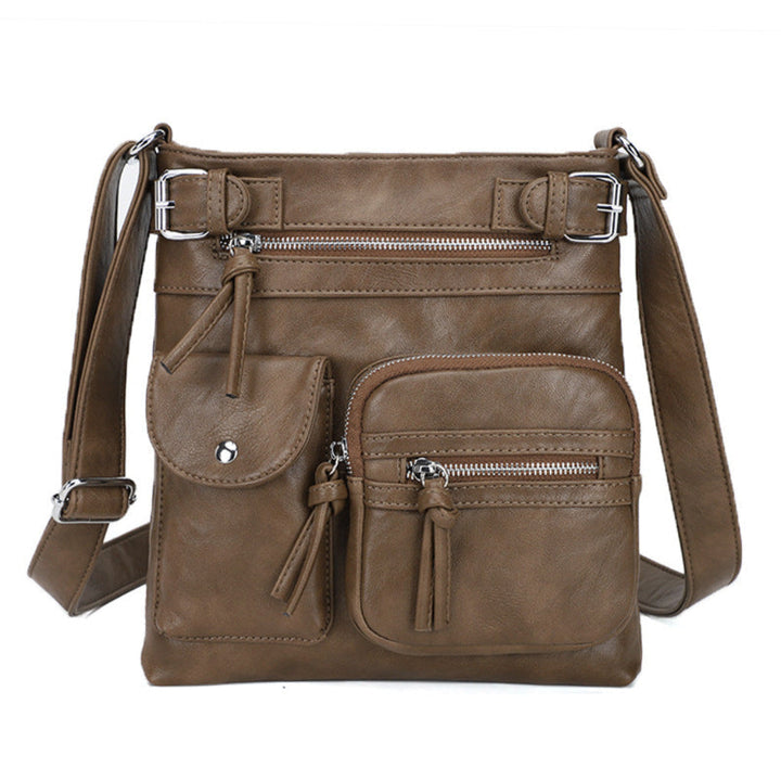 Fashion accessory: women's organized multi-pocket crossbody bag, perfect for stylish everyday wear.