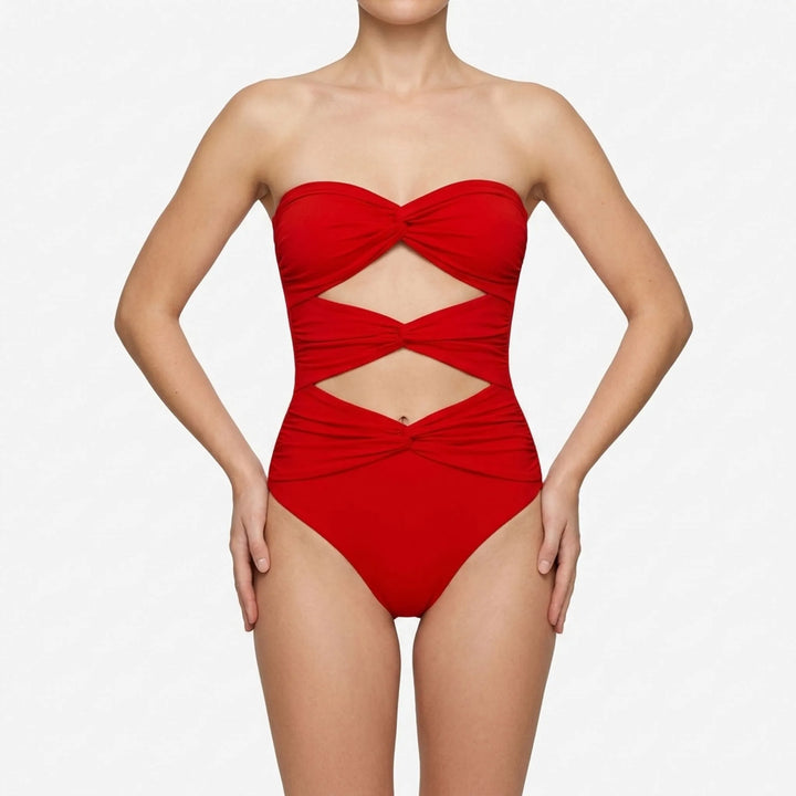 Women's stylish cutout swimwear with a flowing swim skirt. Your go-to vacation fashion.