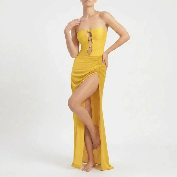 Women's two-piece cutout swimsuit and swim skirt. Trendy vacation fashion with a unique design.