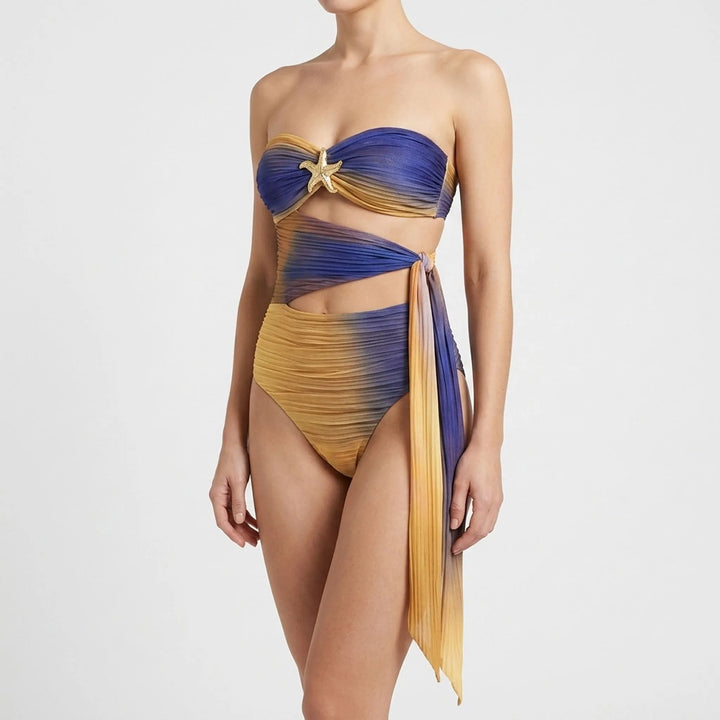 Stylish women's cutout swimsuit with skirt. A perfect beach outfit, featuring adjustable straps.