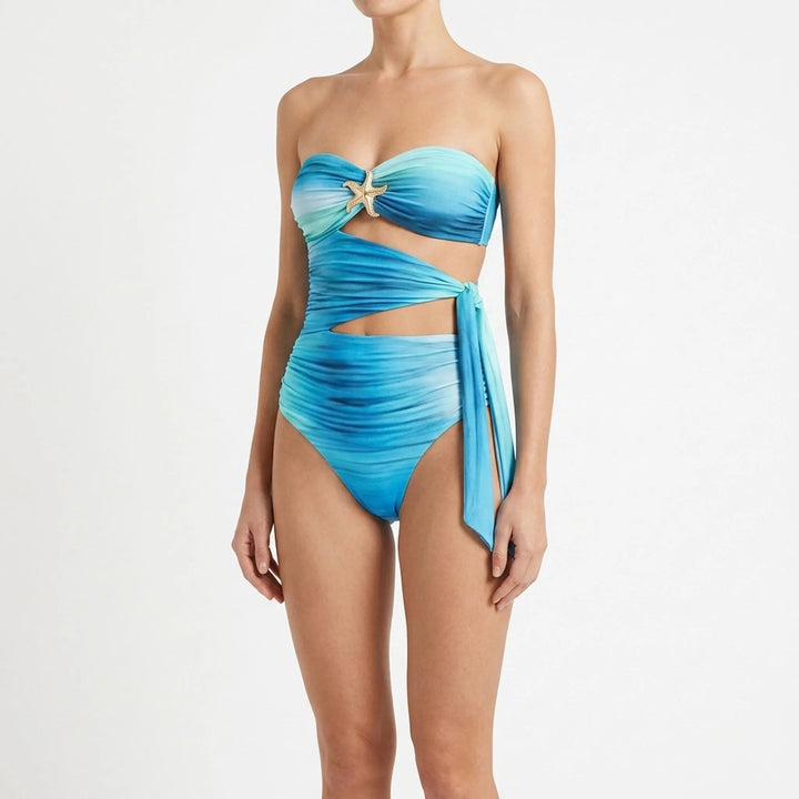 Women's cutout swimsuit with skirt, a trendy resort wear choice. Adjustable straps ensure perfect fit.