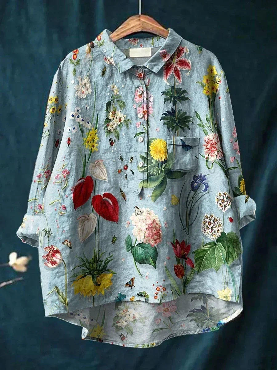 Stylish women's floral loose-fit blouse. Perfect for casual spring/summer wear. Comfortable and elegant everyday top.