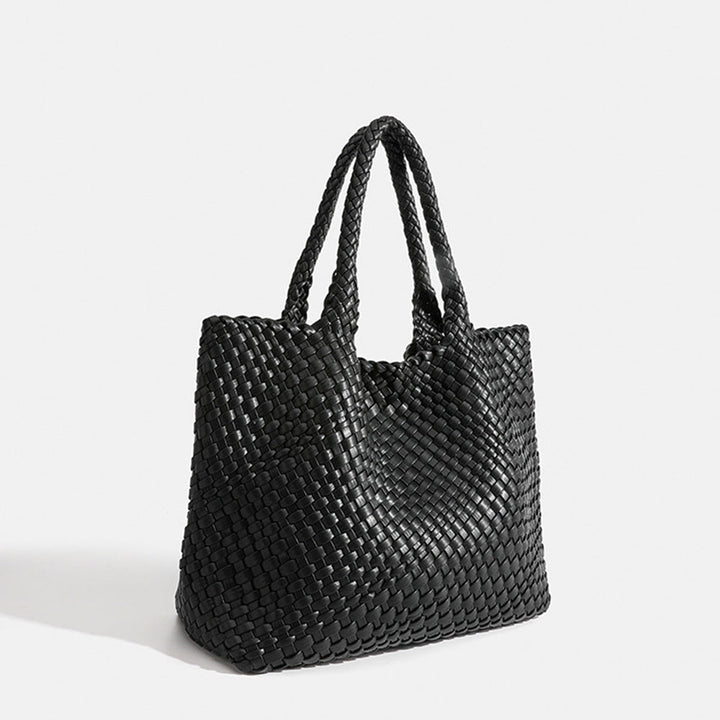 Elegant women's shoulder bag, large woven texture, perfect for a sophisticated everyday look.