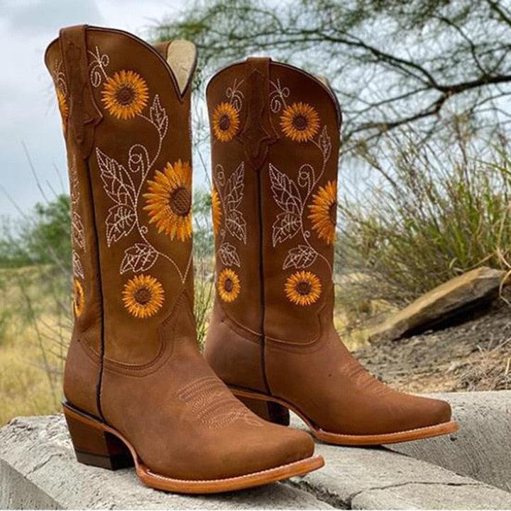 Bohemian brown Mira Ibiza Spirit women's boots with eye-catching sunflower print, embodying unique festival footwear.