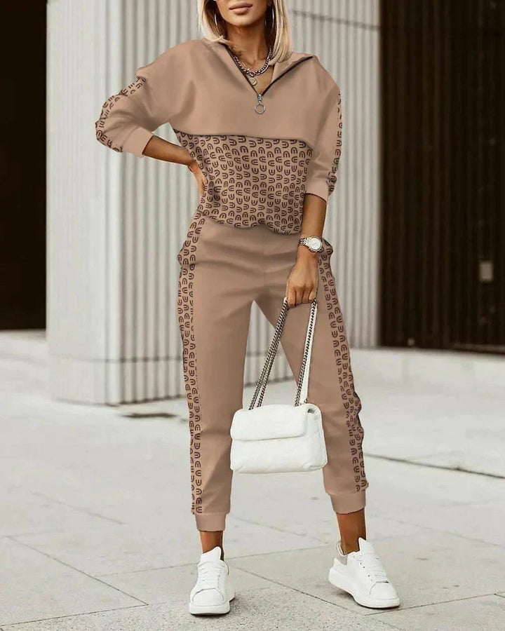 Versatile women's activewear tracksuit set, offering modern style & comfort for workouts, travel, or casual outfits.