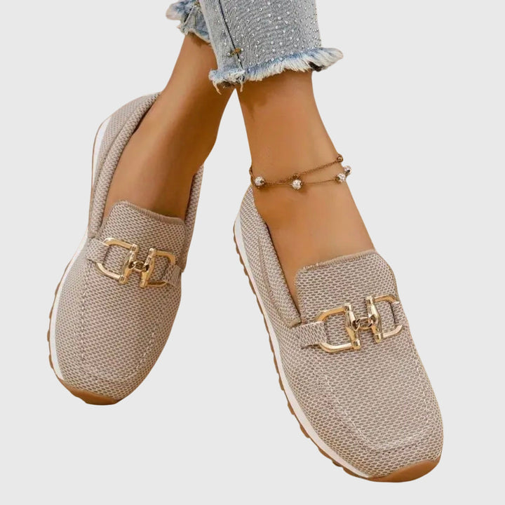 Comfortable women's slip-on loafers with orthopedic features for all-day support.
