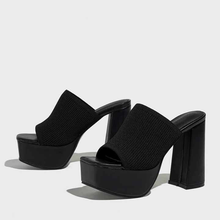 Modern women's platform sandals with an elevated sole, offering comfort and style for versatile summer footwear.