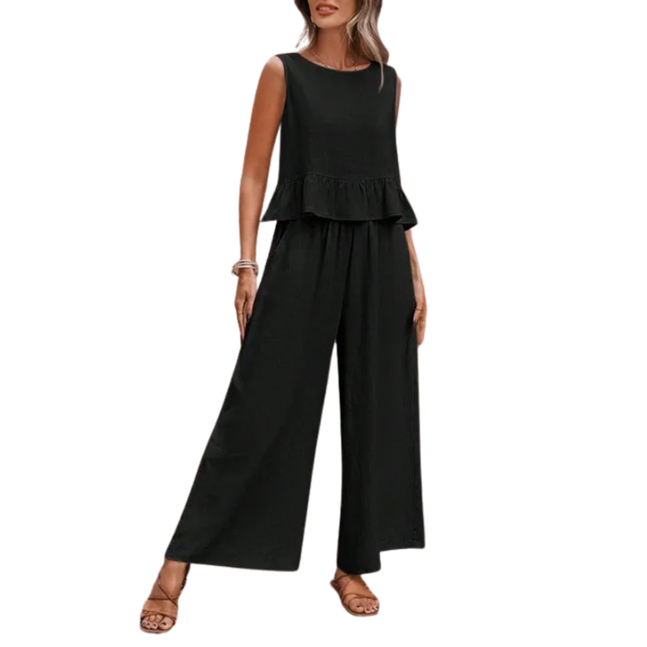 Elegant women's coordinated ruffle tank top & wide leg pants set, comfortable versatile apparel for warm weather.