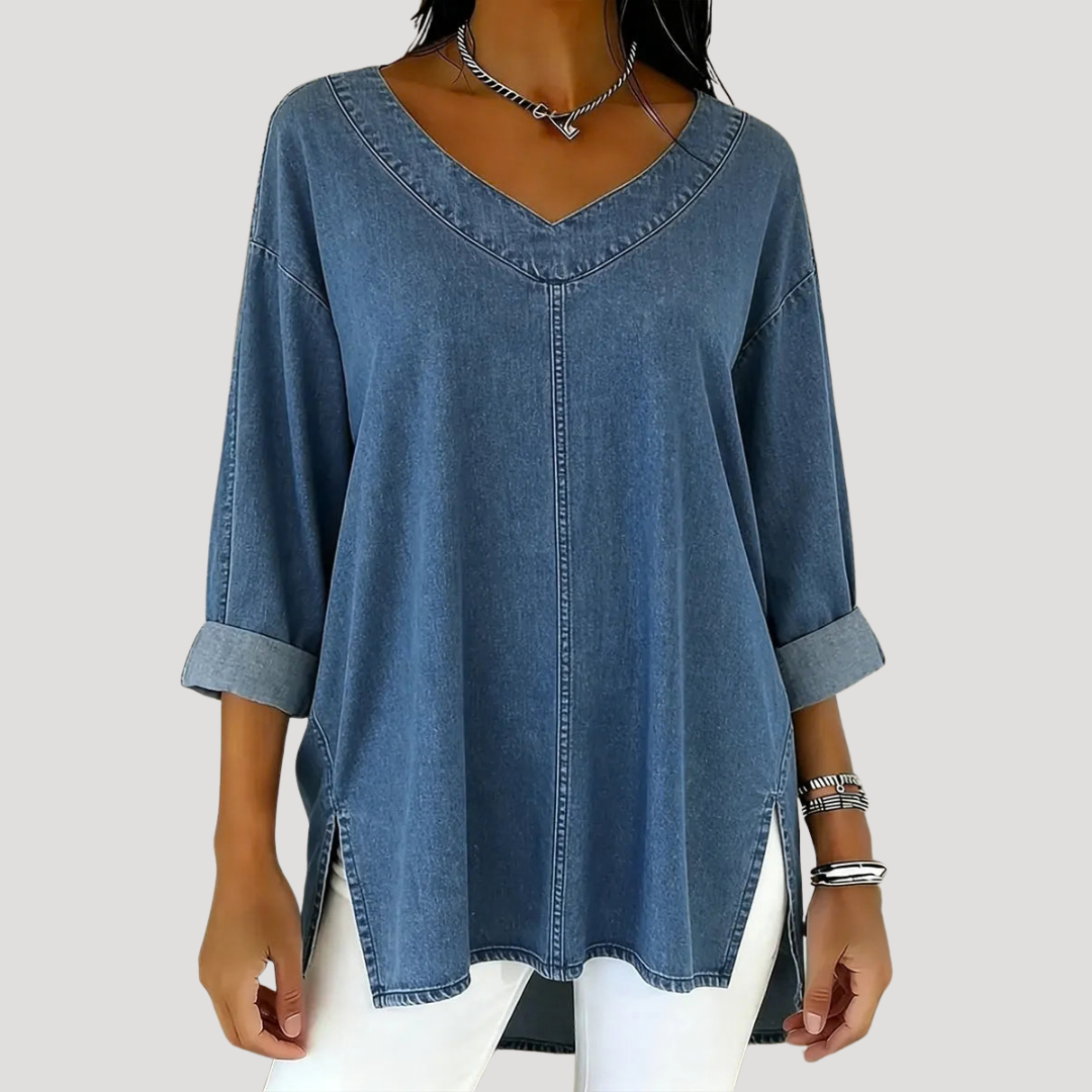 Stylish women's V-neck tunic top with elbow sleeves for a comfortable, relaxed fit. Perfect casual wear.