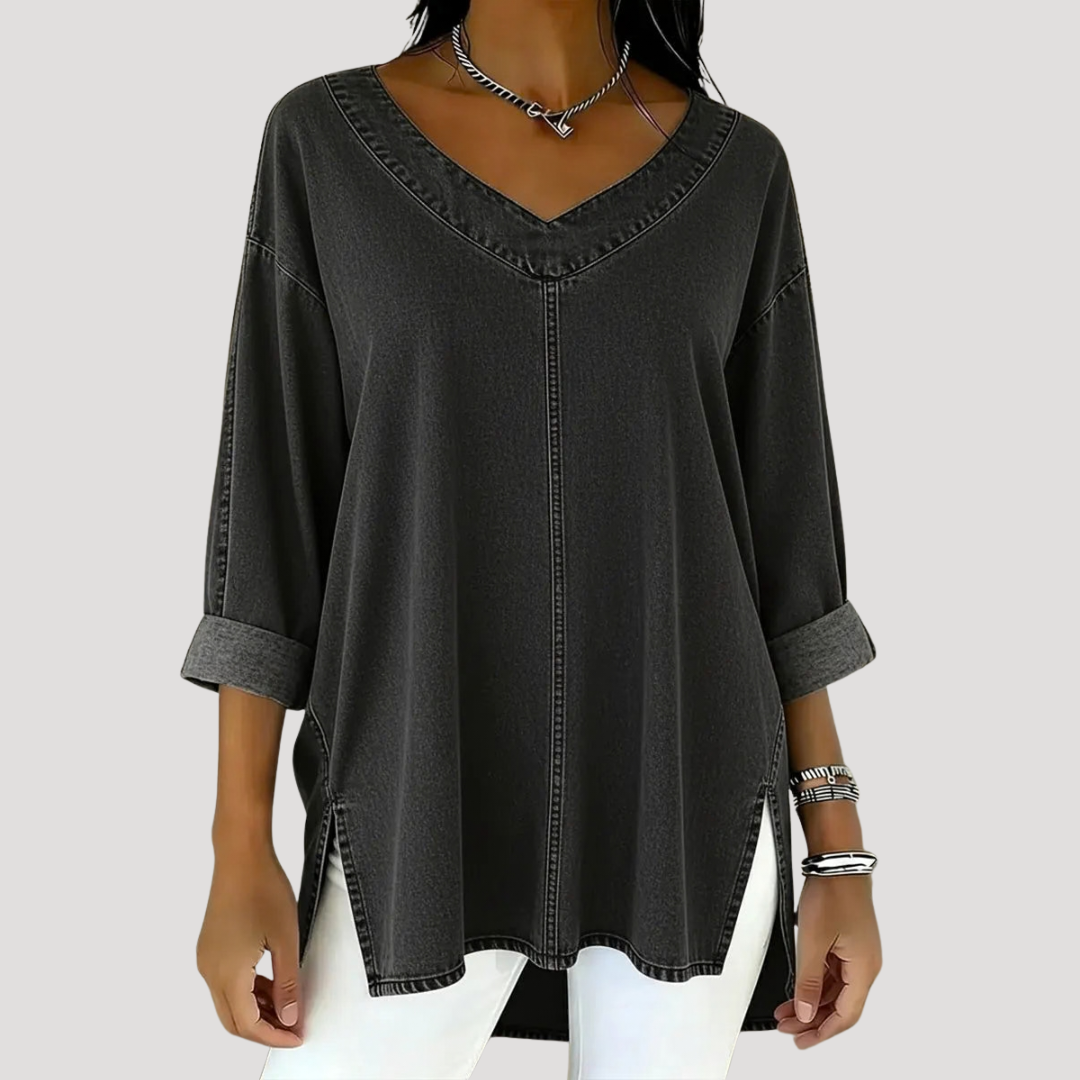 Effortless V-neck tunic top for women, featuring elbow sleeves & a relaxed, longline fit. Versatile casual wear.