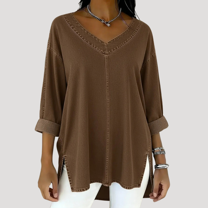Stylish ladies V-neck tunic top with elbow sleeves. Longline & relaxed fit for comfortable, modern casual wear.