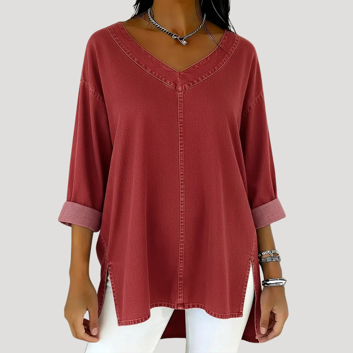 Effortless longline V-neck tunic top for women with elbow sleeves, offering a comfortable and stylish relaxed fit.
