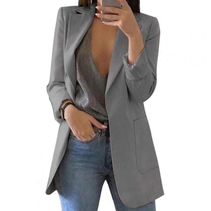 Modern ladies blazer jacket, ideal for professional attire & business casual. Features a sleek design & pockets.