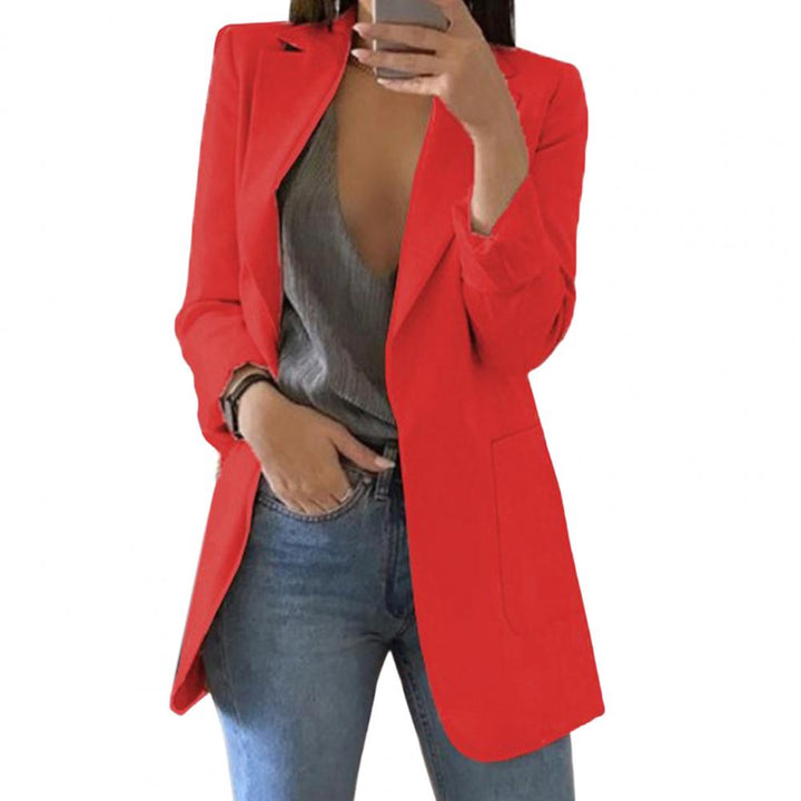 Ladies business casual blazer jacket with a modern design. This stylish piece includes practical pockets.