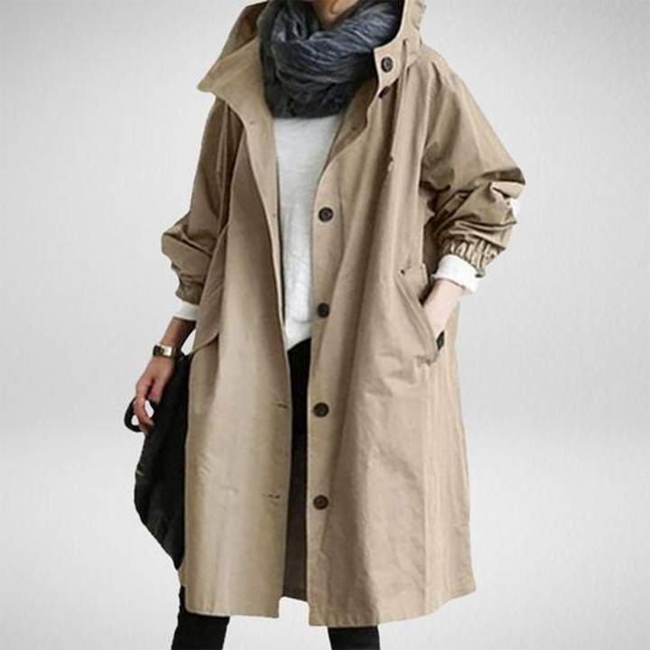Practical women's hooded long raincoat, providing excellent weather protection & a chic look.