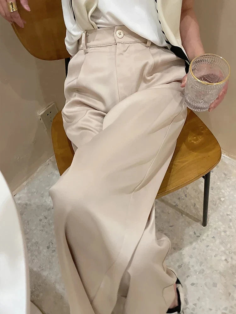 Full length women's pants featuring a comfortable wide leg, high waist, and loose fit for casual elegance.