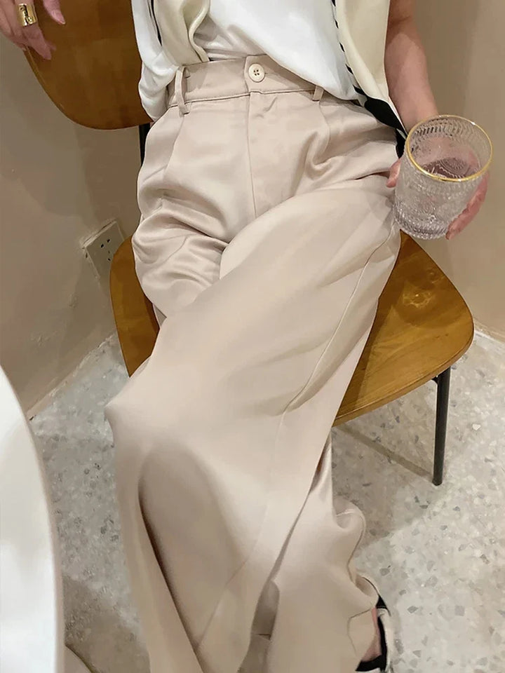 Full length women's pants featuring a comfortable wide leg, high waist, and loose fit for casual elegance.