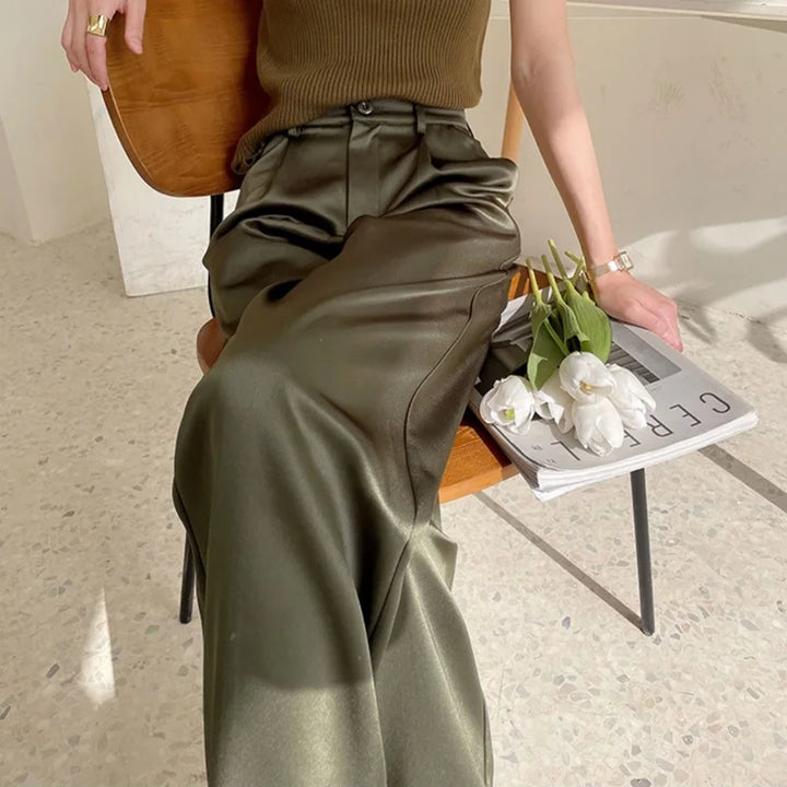 Front view of model wearing full length wide leg high waist pants, loose fit, great for casual summer style.