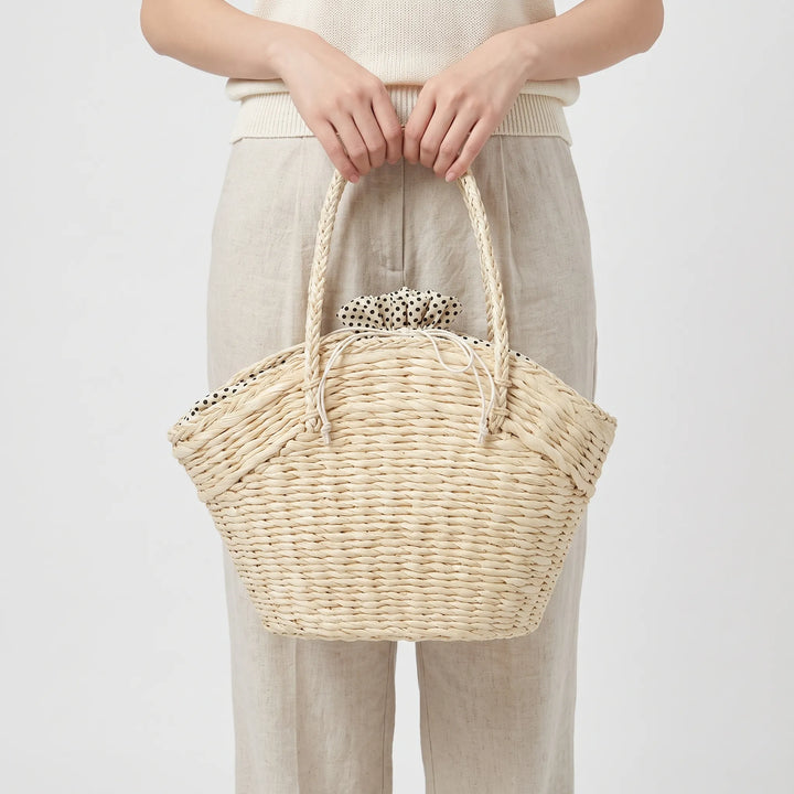 Elegant woven women's tote bag, a spacious and stylish shoulder carryall for summer. Great for casual everyday use.