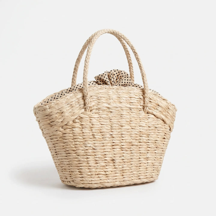 Spacious women's woven tote bag, a stylish and versatile carryall. Perfect for everyday, beach, or summer travel.