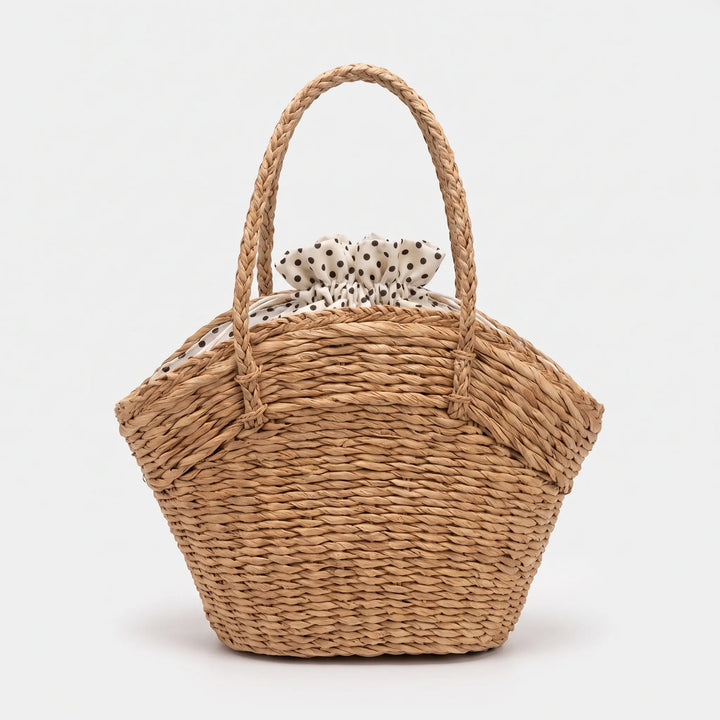 Chic neutral woven tote bag for women, a stylish and practical summer carryall. Perfect as a casual shoulder bag.